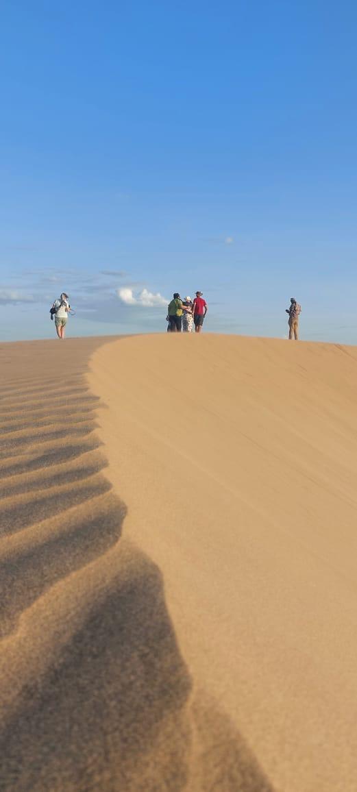 Clients on the Chalbi Desert dunes, Northern Kenya